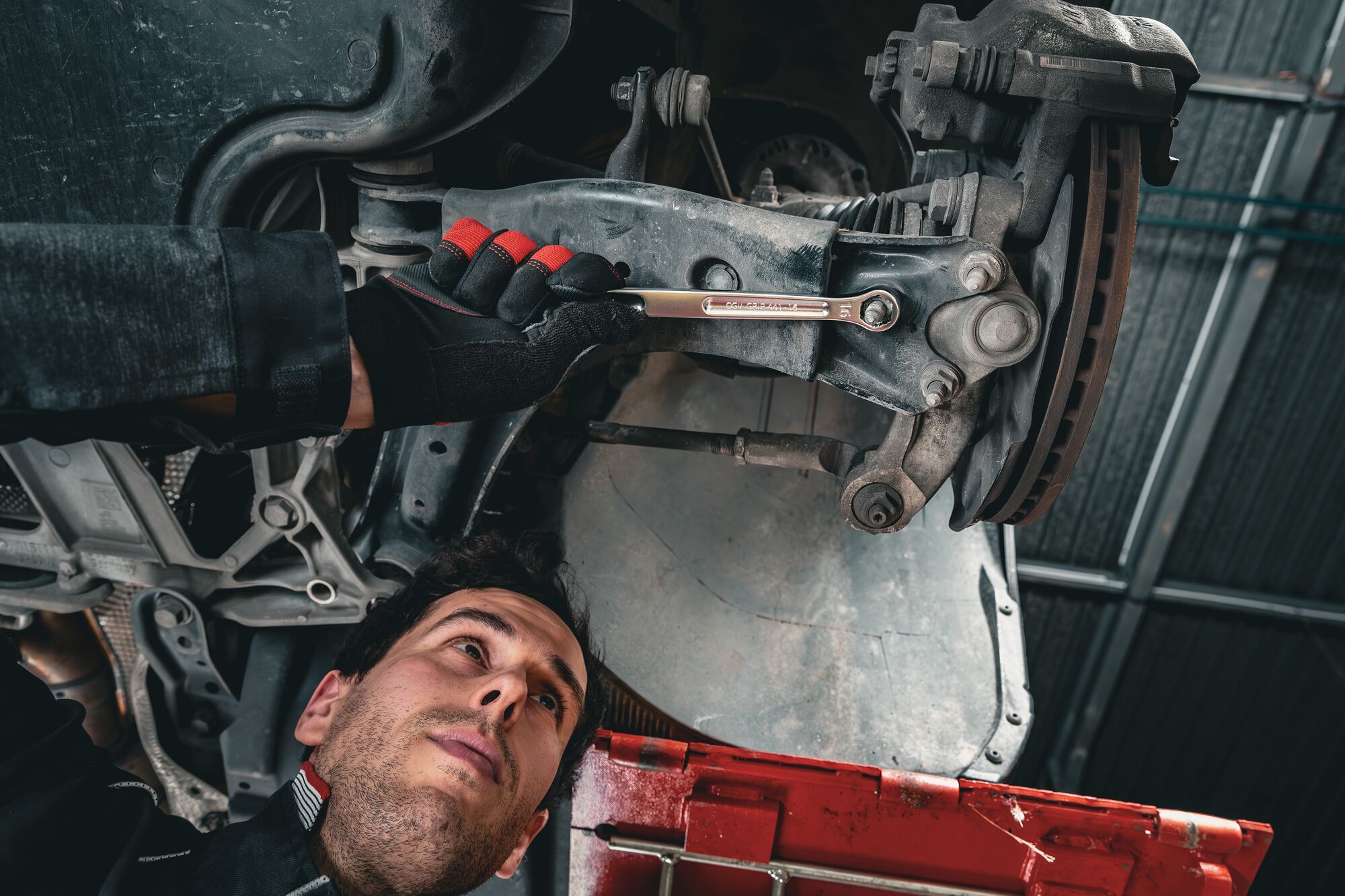 Grip long combination wrench in use Grip long combination wrench in use