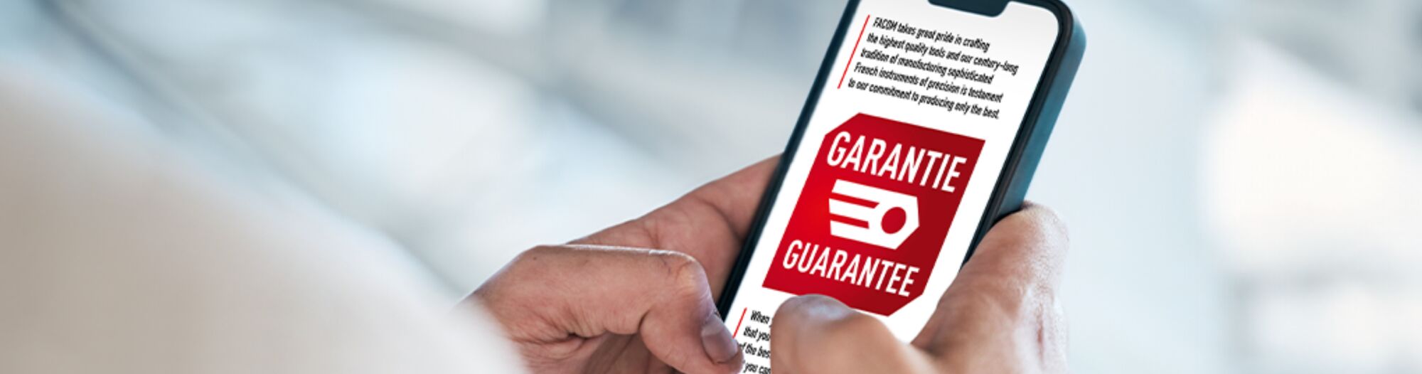 FACOM guarantee information displayed on smartphone screen. FACOM guarantee information displayed on smartphone screen.