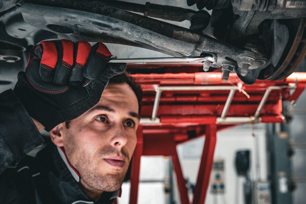 Grip long combination wrench in use Grip long combination wrench in use