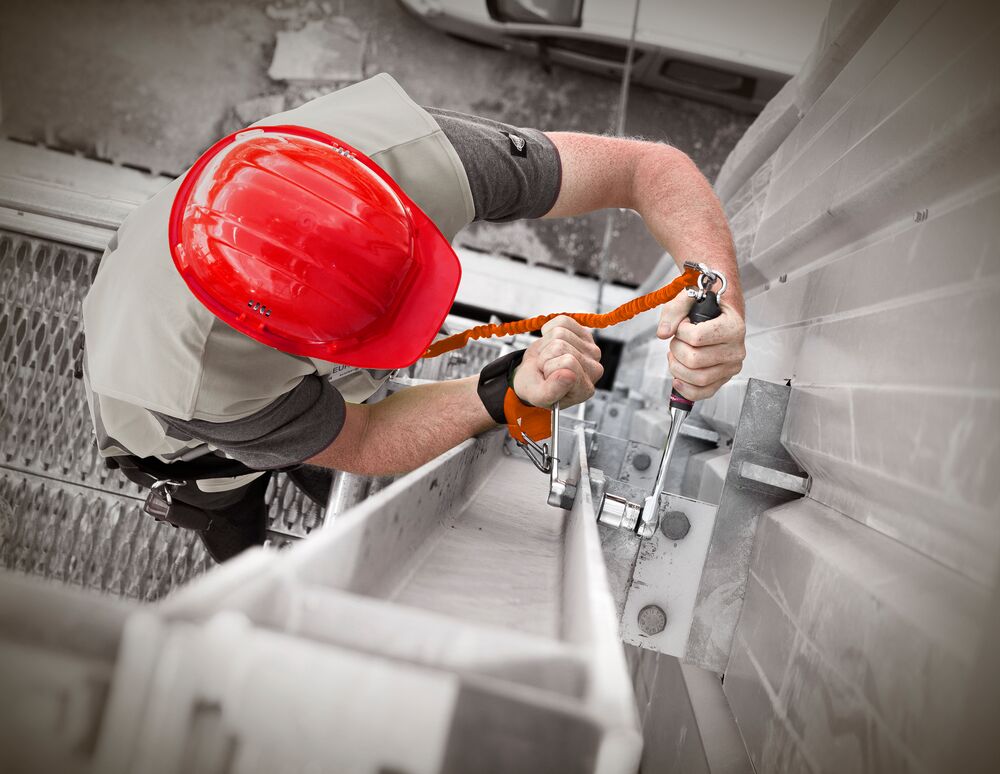 Technician working at height with FACOM tools Technician working at height with FACOM tools